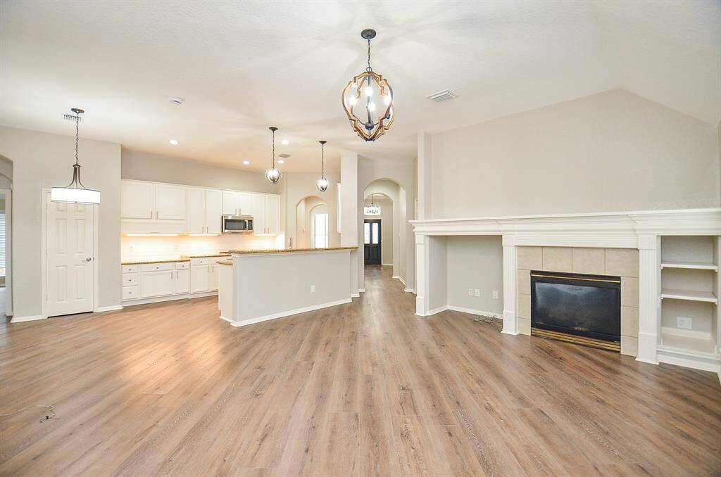 This spectacular living/family area is your own personal showplace, for everyday and special day entertaining --- casual or something more! Glorious high ceiling and tremendous wall and floor space and a fabulous fireplace are yours to explore!