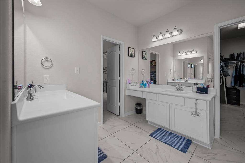 Lots of storage in the Primary bath and separate vanities