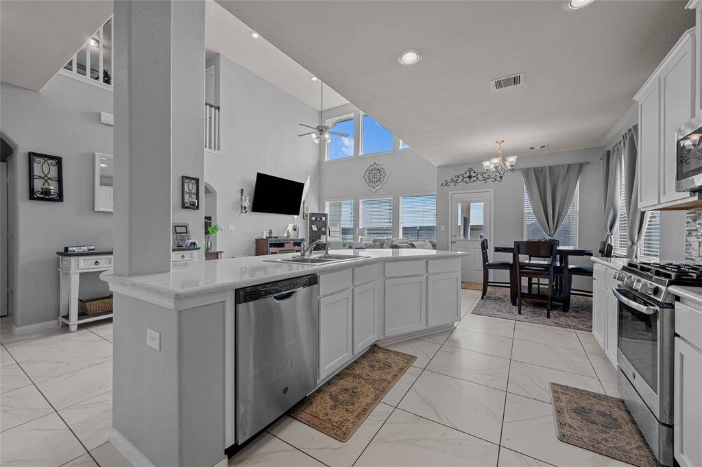 Large kitchen with plenty of storage.