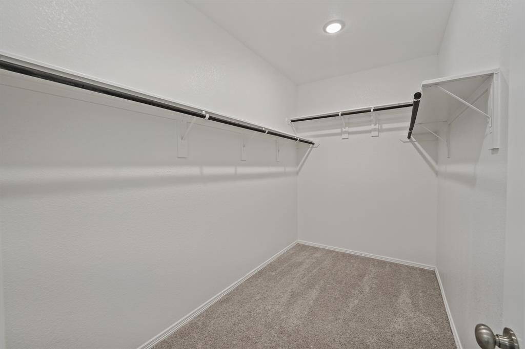 The large Walk In Closet in the Primary Suite offers plenty of storage to accommodate your needs!