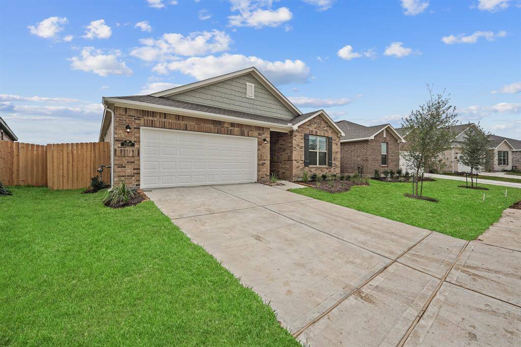 Beautiful Brick Front Elevation, extended driveway for additional parking, and Luscious Landscaping offered upon arrival to this Exquisite Home!