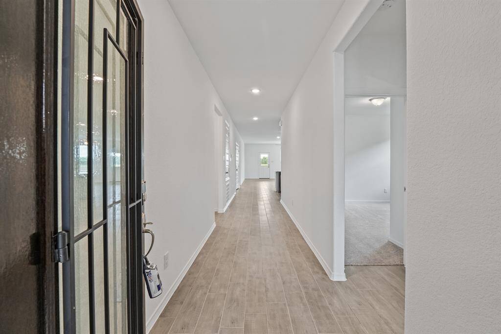 Fantastic Formal Foyer accompanied with Terrific Tile Flooring and Easy Access to the open floor plan greet you upon entry to this Elegant Home!