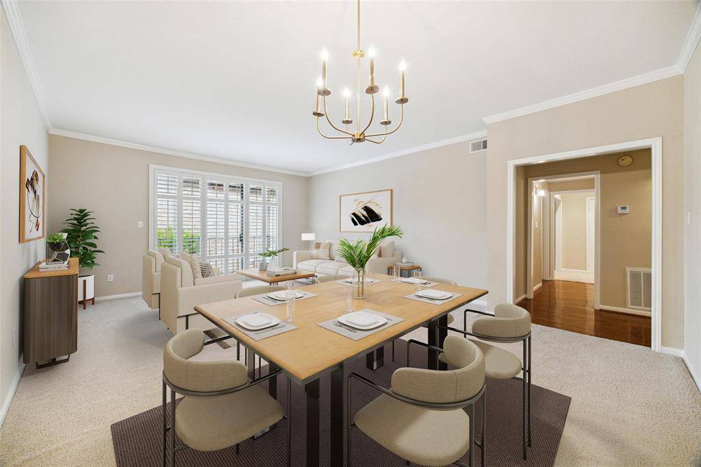 Spacious living and dining room with a nice balcony that lets in lots of light.Virtually Staged