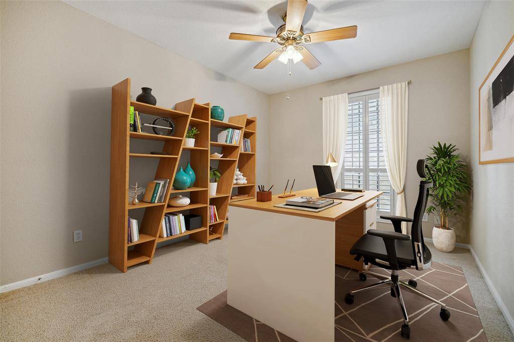 Secondary bedroom (Virtually staged as an office) is also really spacios and has plantation shutters.