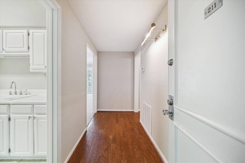 Welcome to The Brentwood Condos! Formal entryway with hardwood floors.