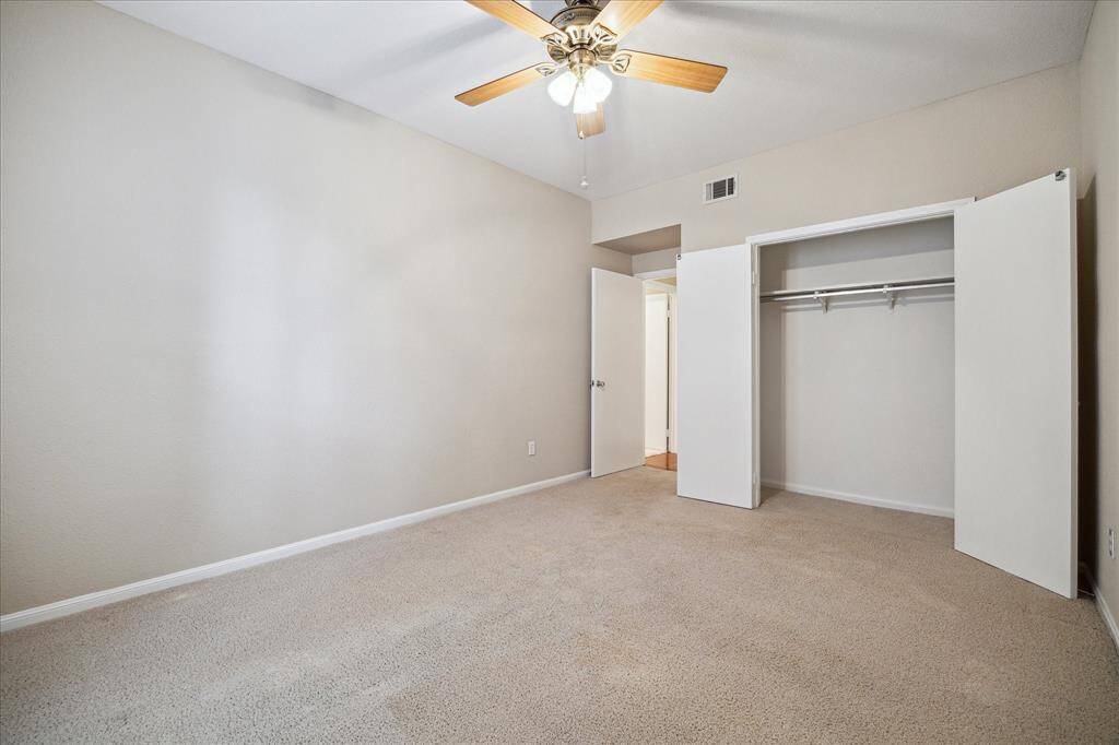 Closet in secondary bedroom.