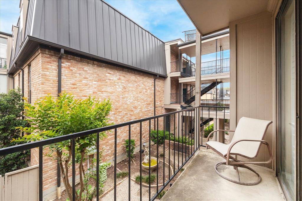 Balcony looks down to the courtyard.