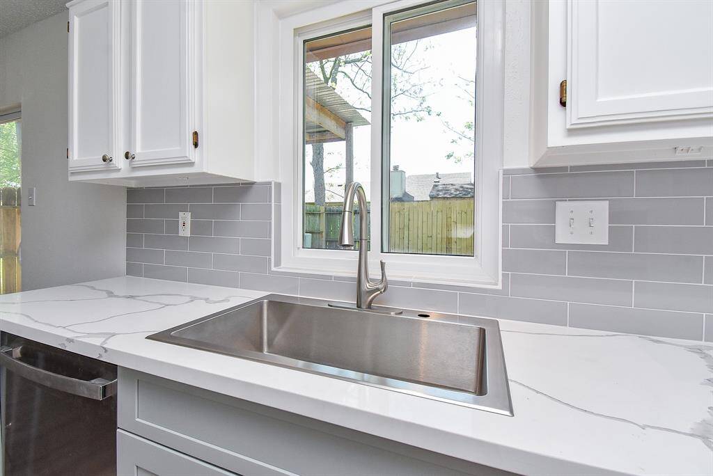 This stainless sink is huge.  Wash pots/pans/bathe a baby or a dog?