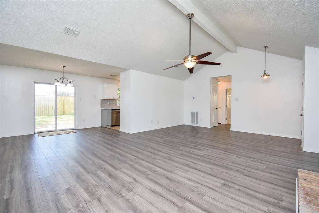 View of dining room with adjacent kitchen