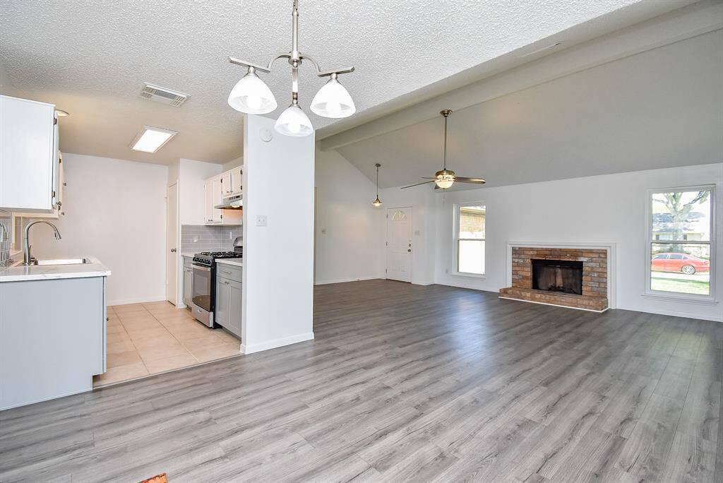 Family room with glimpse of kitchen