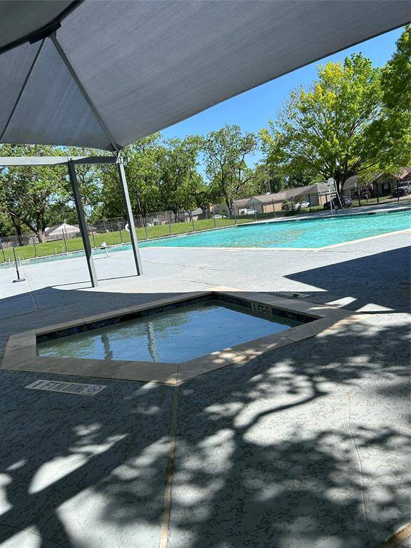 Walk or bike half a block to neighborhood pool