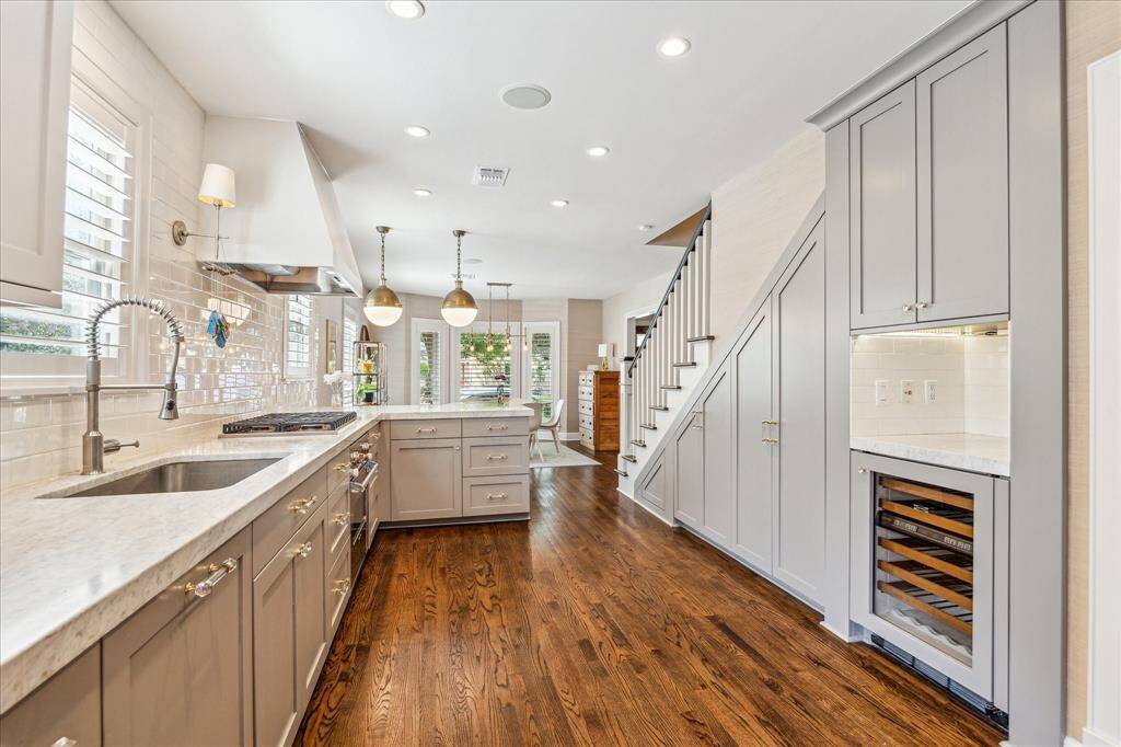 Chef's kitchen with Viking range and wine fridge, plenty of custom storage