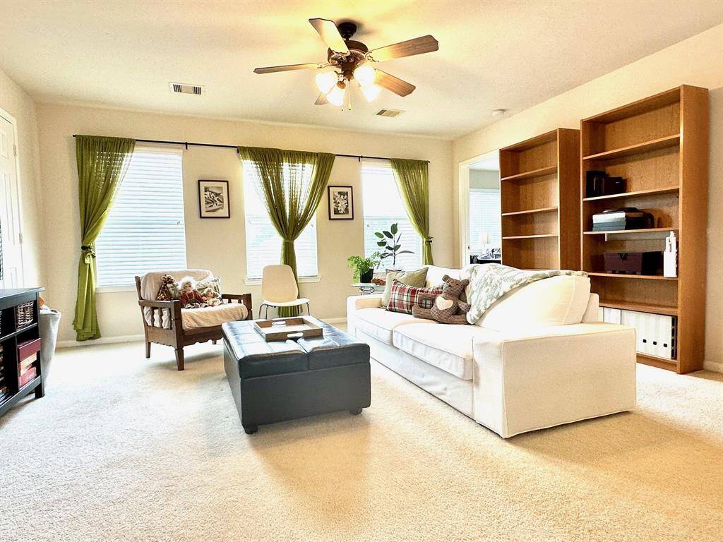 Check out the den upstairs! Perfect for entertaining guests and family!