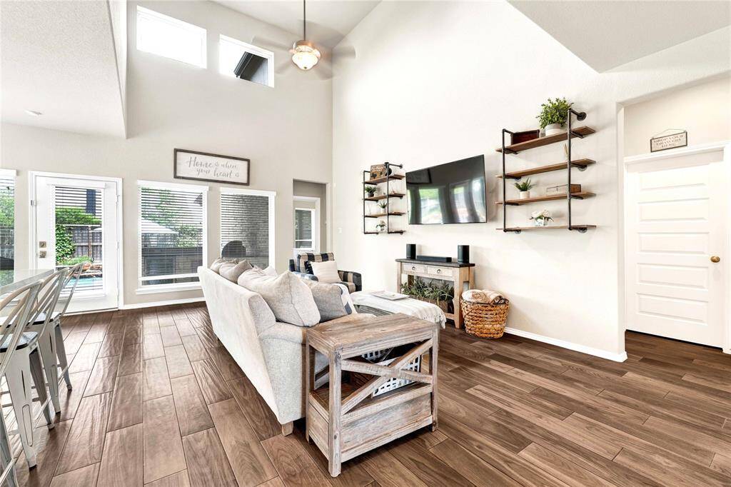Vaulted ceiling living room with natural light