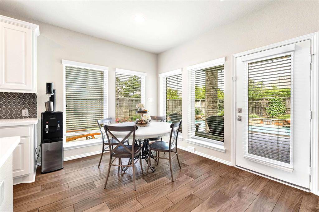 Spacious dining area located near custom back patio