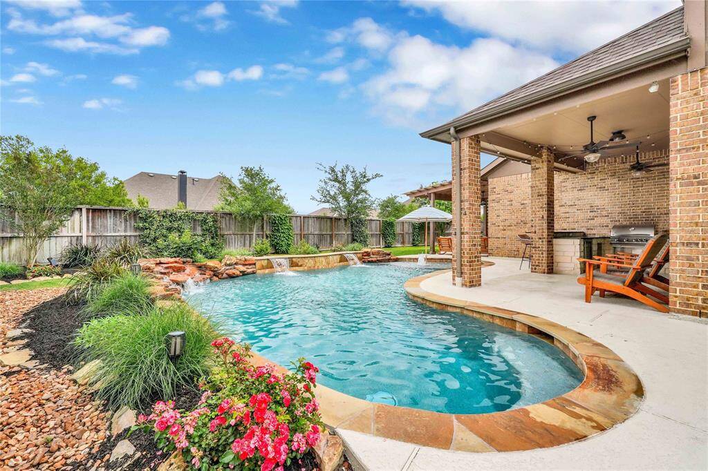 Custom designed pool and backyard with over $90,000 in additions!