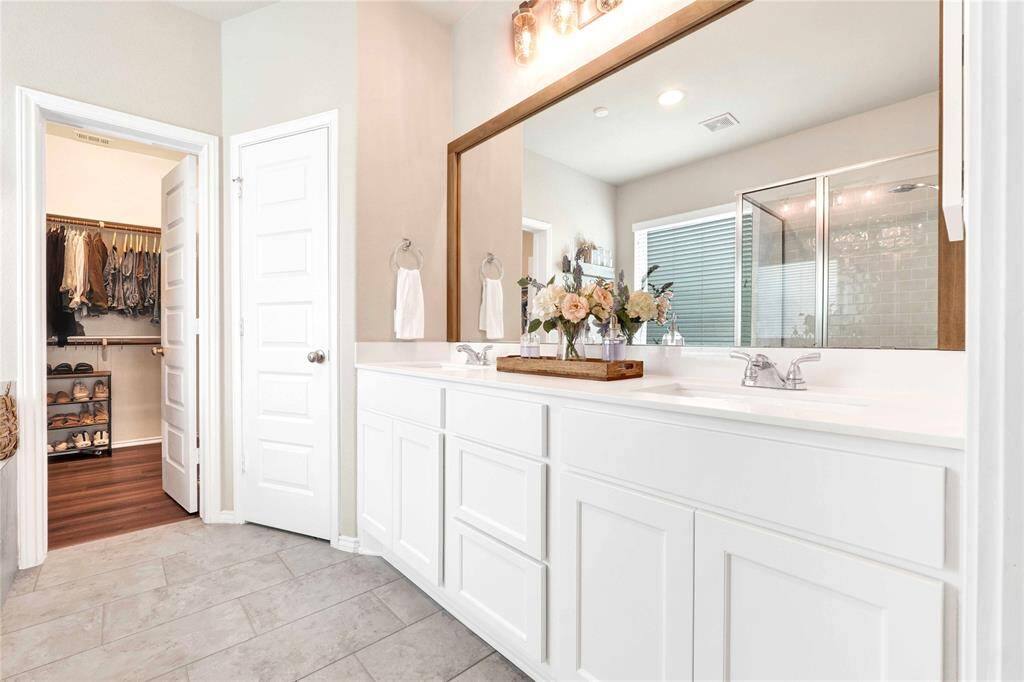 Additional drawers for storage with HUGE walk-in closet with ALL luxury flooring!