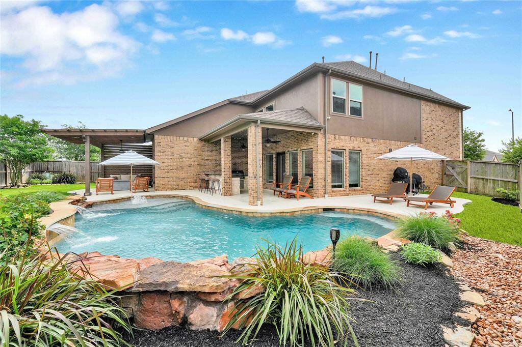 Complete backyard Oasis with waterfall features