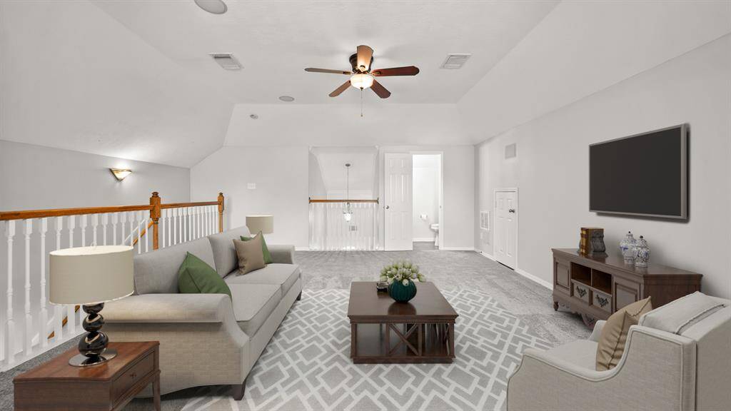 Virtually Staged: WOW! This amazing loft is perfect for entertaining! Right upstairs, this space features a ceiling fan, and carpet floors.