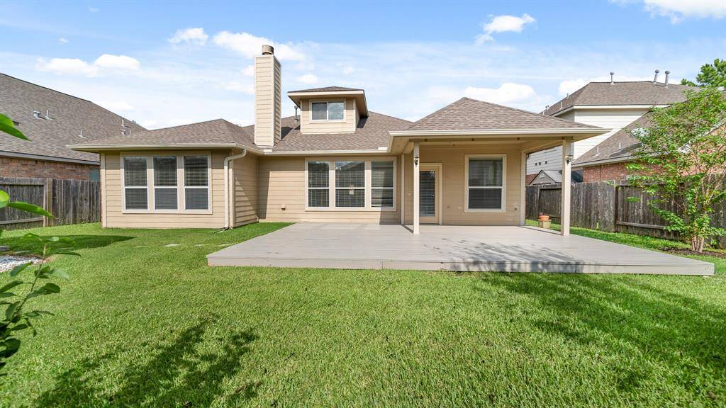 Welcome to your new backyard! Check out all of that wonderful green space for the kids and pets to run around in.