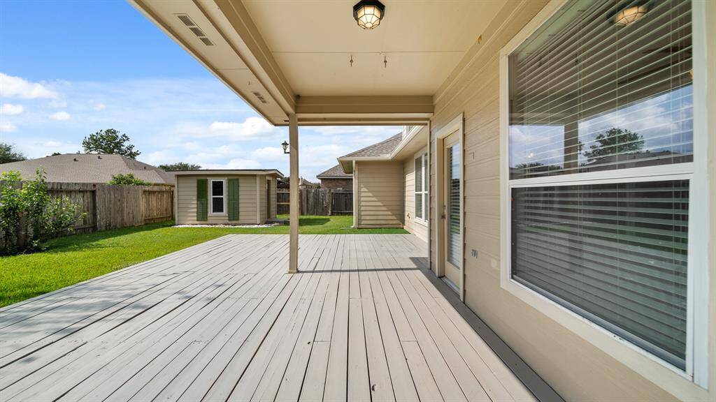 Fantastic covered patio perfect for entertaining family, friends, and guests.