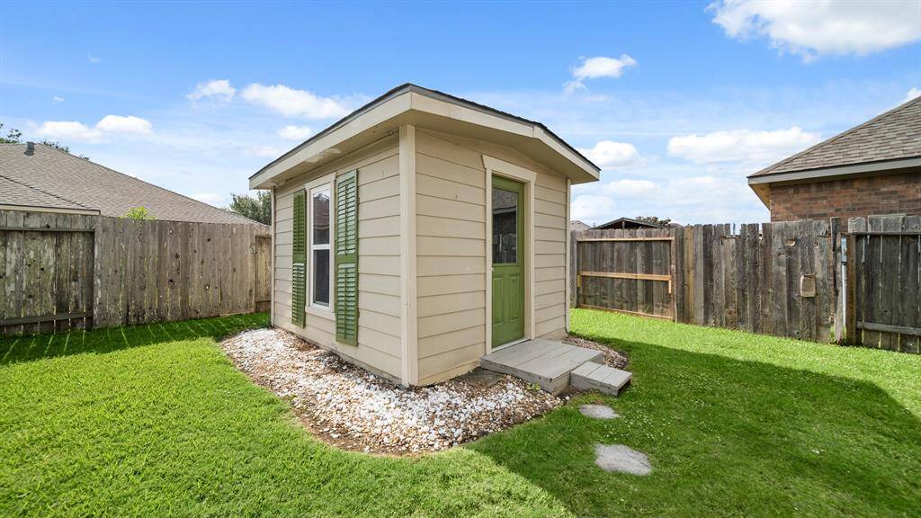 Shed perfect for additional storage in the backyard.