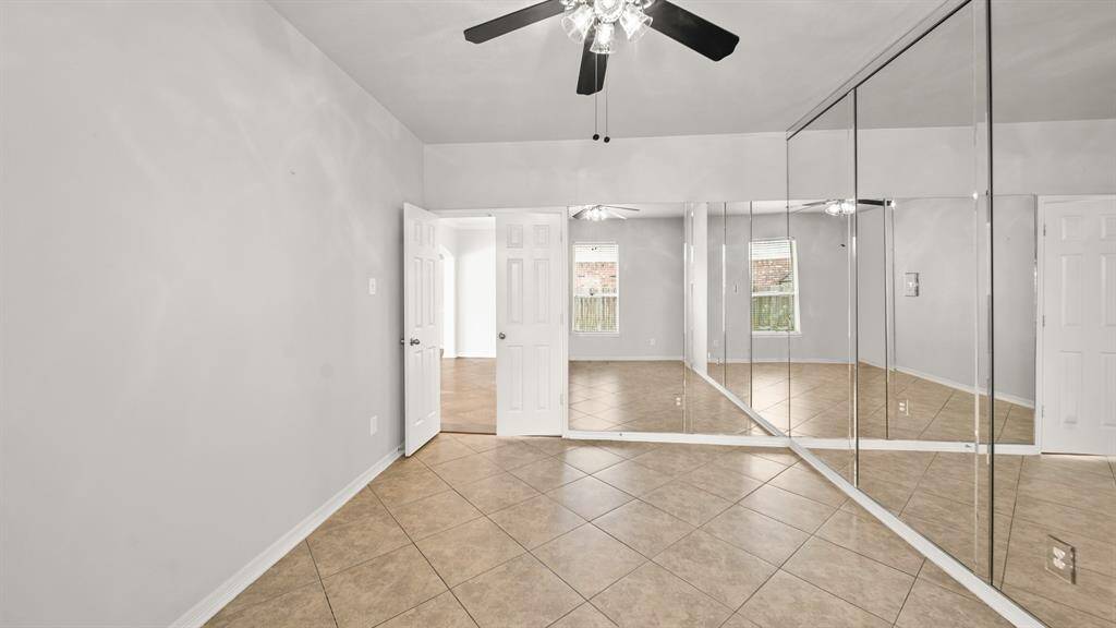 Another view of the home office showcases how spacious it is.