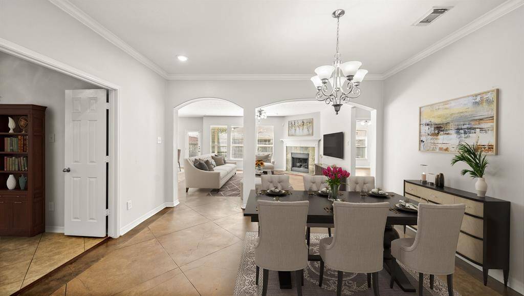 Virtually Staged:This floor plan seamlessly connects the dining room with the home office, living room, kitchen, and the breakfast nook.