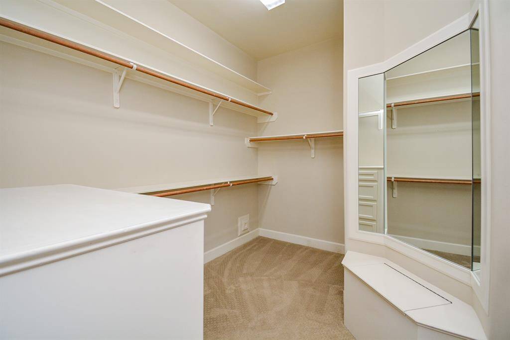 One can never have too many closets. This primary walk-in, however, is unlike all others!