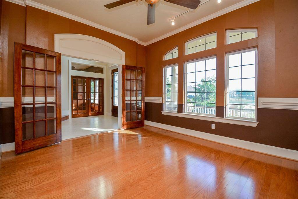 This kind of exquisite, open space (on both sides, off the main entrance hallway/foyer), is an unequalled feature in a one-of-a-kind residence!