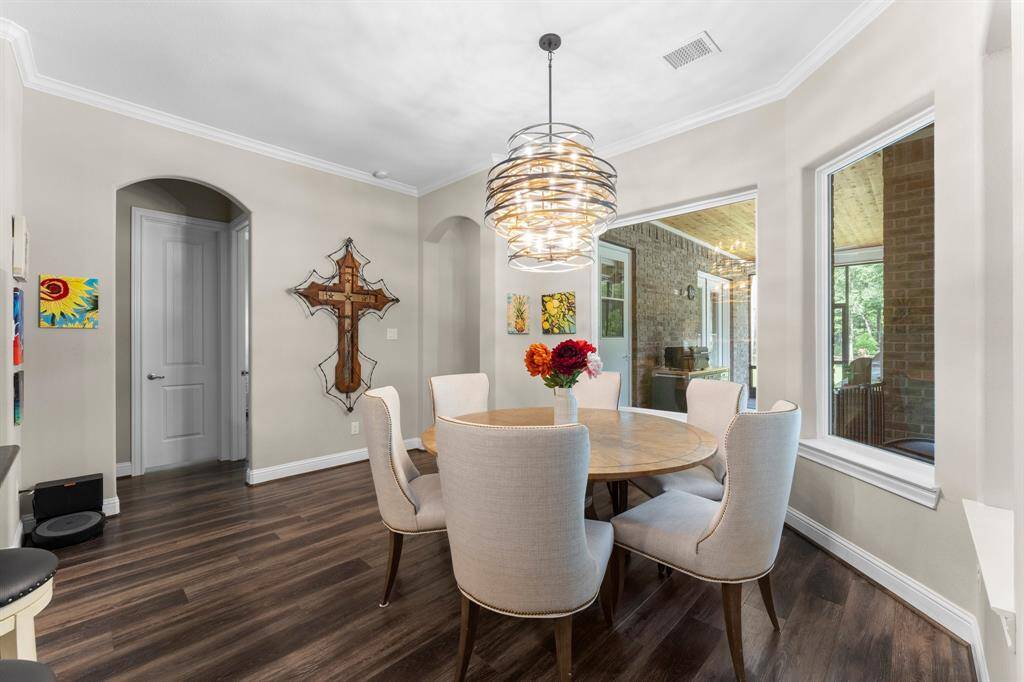 Whether you're savoring a peaceful breakfast or having a casual meal, you will certainly enjoy the view to your backyard through the large windows.