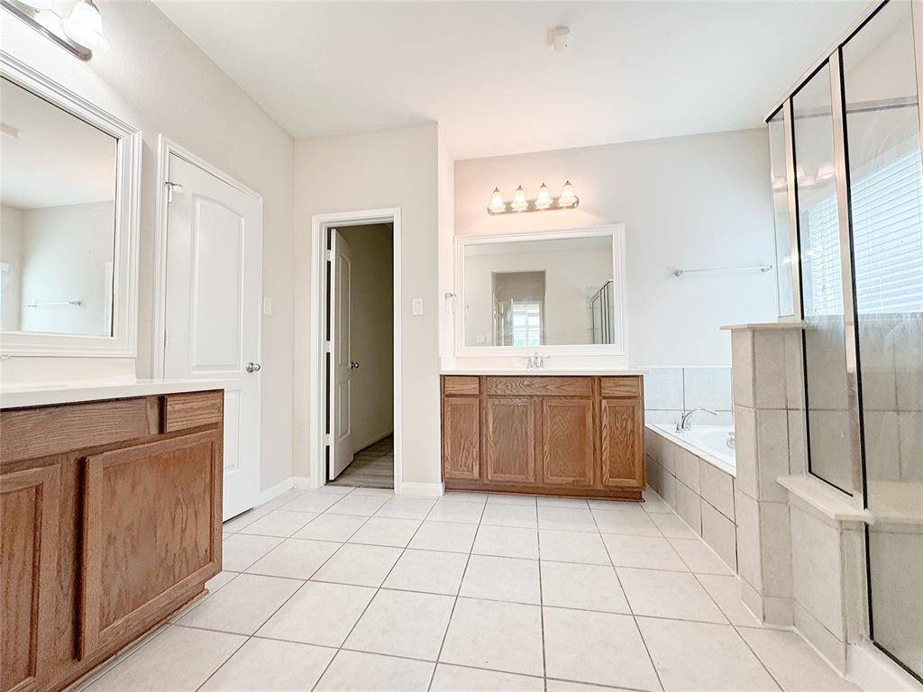 Primary bath with separate vanities