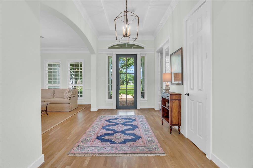 A look back toward the Foyer displaying the Arched Entry to the Formal Living room & the 8' Front Door! 27103 Boater's Crossing Dr., Katy, TX  77493