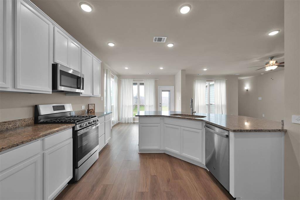View of the kitchen from the formal area