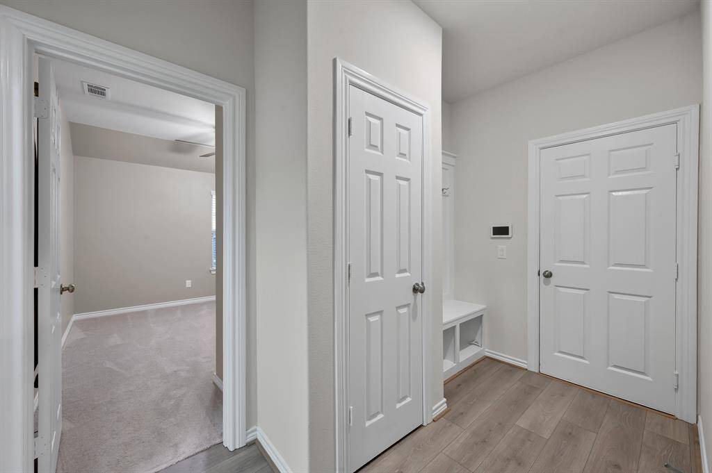 Hall closet with storage.