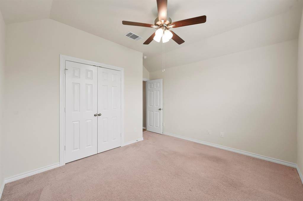 Secondary bedroom #1 has plenty of storage with their own closets, beautiful neutral carpet, and wonderful natural light.