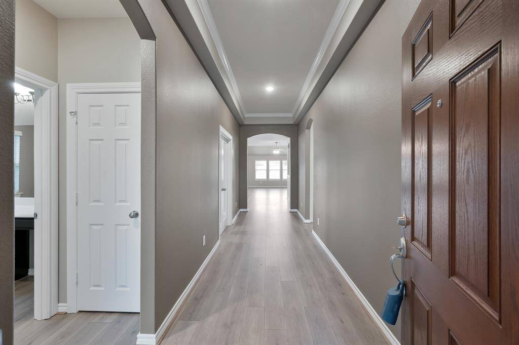 Bright light welcomes you as you enter the home, sharing an open floor plan from the start.