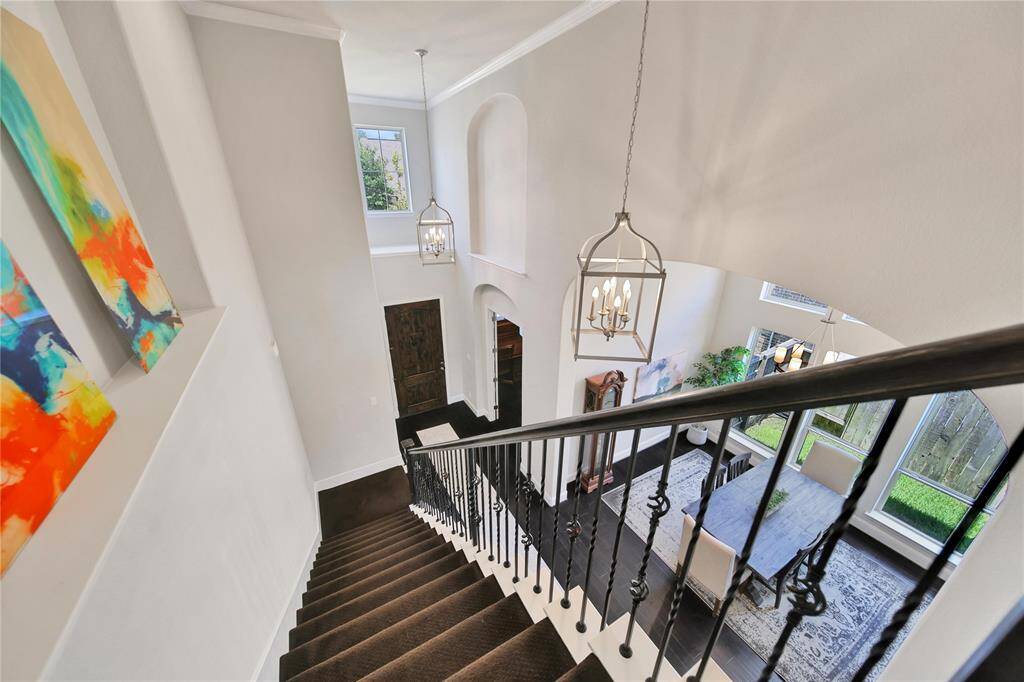 Staircase with dining room view.