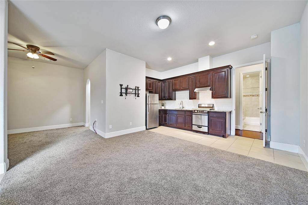 Guest Suite with full kitchen, bath and walk-in closet.