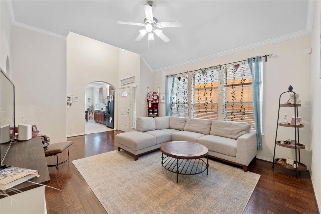 Spacious Living Room area with tall ceilings and great lighting!