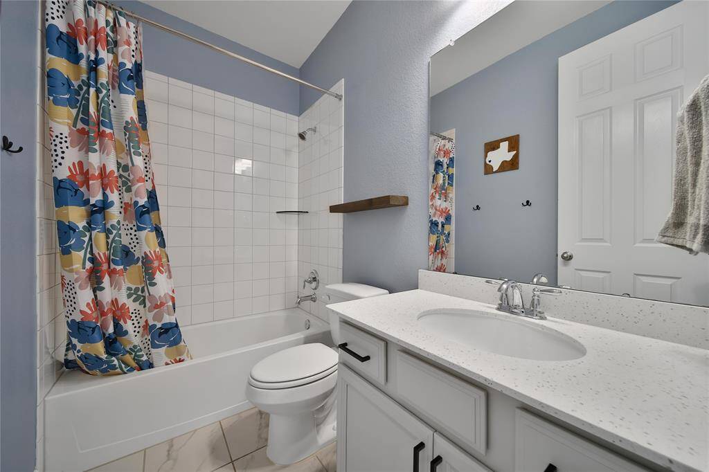 View of secondary bathroom #1.