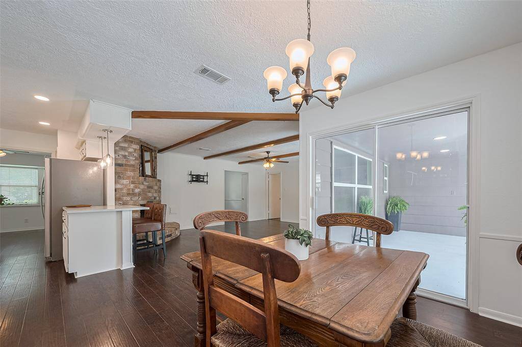Another view from breakfast room to the covered patio and living space.