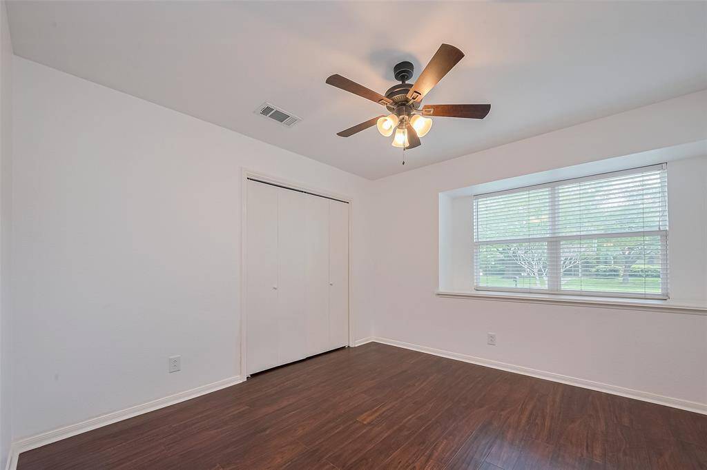 Bedroom #1 with ceiling fan.