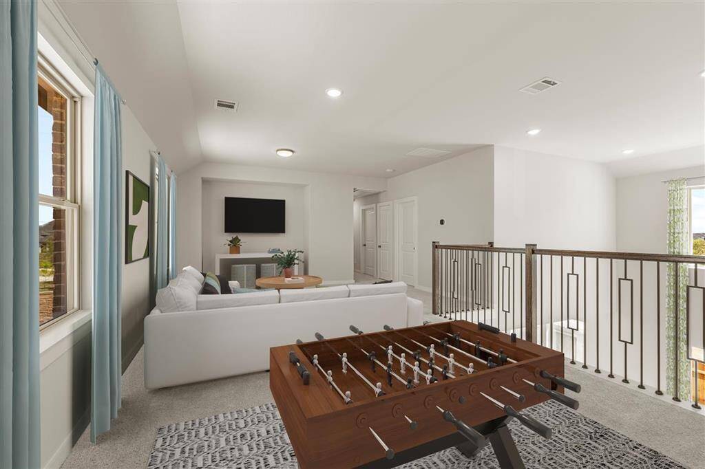 Huge game room upstairs is the perfect place to hang with friends and family!
