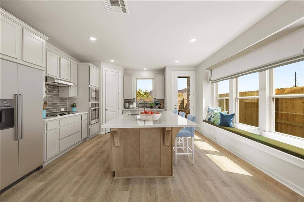 Kitchen is a dream with lots of seating space for guests