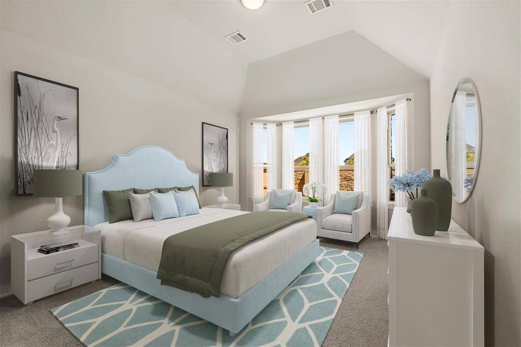 Primary suite is a true retreat with freestanding tub