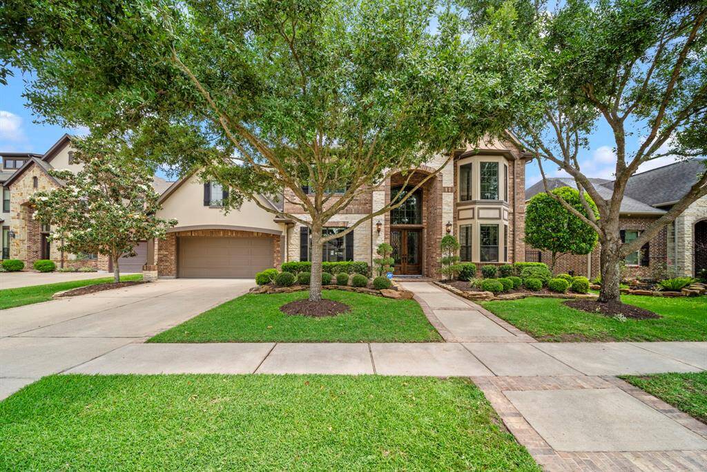 Spectacular home backs to walking trails and waterview