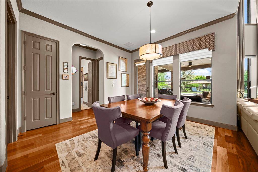 The breakfast room is roomy and opens to the backyard kitchen and pool area