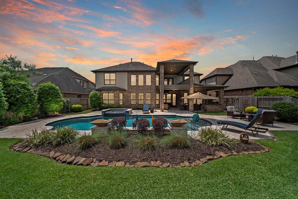 The backyard at sunset with the feel of a resort