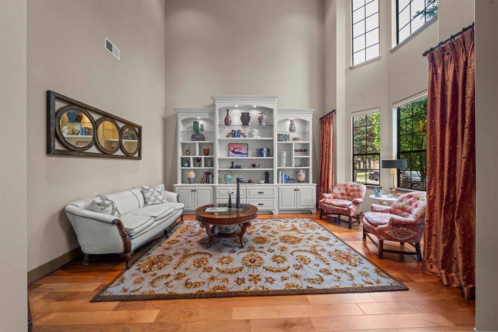 The study has plantation shutters and a custom built in